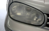 Cloudy car headlight before restoration